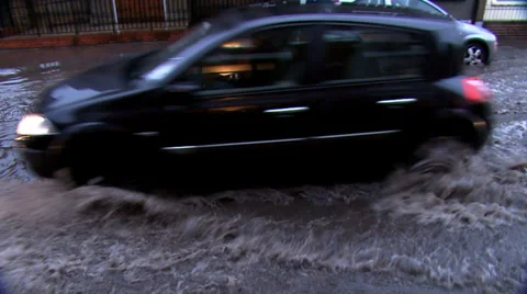 Global warming example of things to come. Flooded road following heavy rains. Stock Footage 32961498