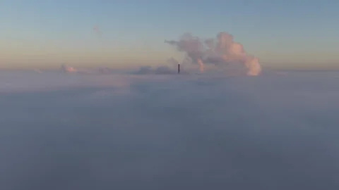 Global warming - Industry pollution over clouds. Climate change Stock Footage 325221655
