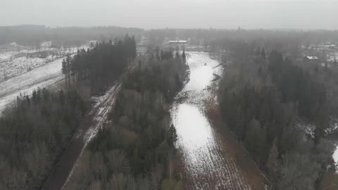 Global Warming With Less Snow on Ski Slope, Scandinavia, Pull Back Aerial 動画素材 147195646