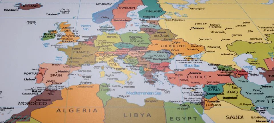 A global world map as a backdrop for themes of trips, travel, hiking, or re.. Stock Photos
