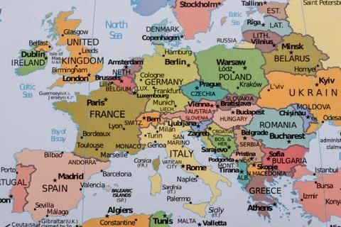 A global world map as a backdrop for themes of trips, travel, hiking, or re.. Stock Photos