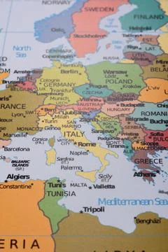 A global world map as a backdrop for themes of trips, travel, hiking, or re.. Stock Photos