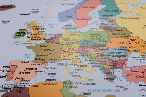 A global world map as a backdrop for themes of trips, travel, hiking, or re.. Stock Photos