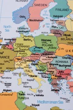 A global world map as a backdrop for themes of trips, travel, hiking, or re.. Stock Photos