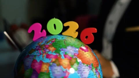Globe with 2026 numbers for future planning, Colorful globe with 2026 letters Stock Footage 321937328
