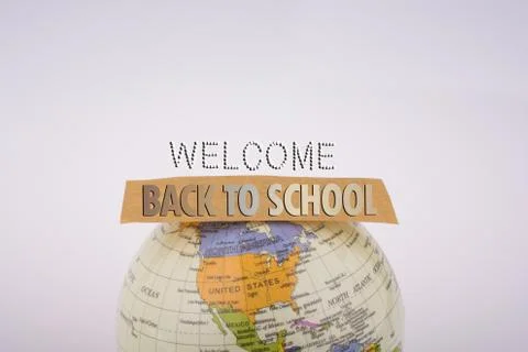 Globe and back to school title Foto stock