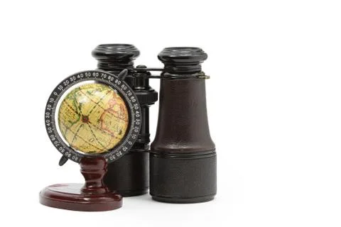 Globe and binoculars Stock Photos