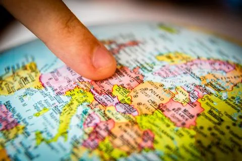 Globe and Finger Stock Photos