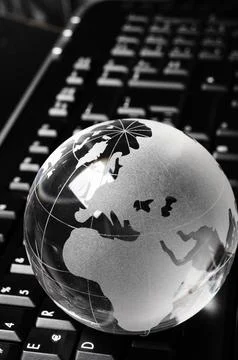 Globe and keyboard Stock Photos