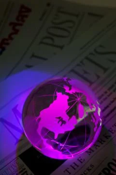 Globe and Newspaper Stock Photos