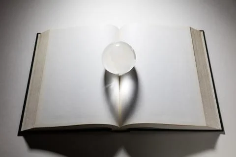 Globe and open book Stock Photos