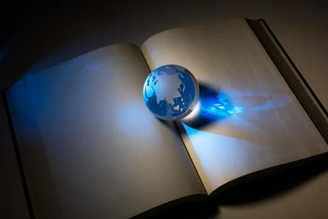 Globe and open book Stock Photos