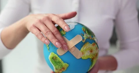 Globe and patch and environmental and medical problems of planet Vídeos de archivo 255807020