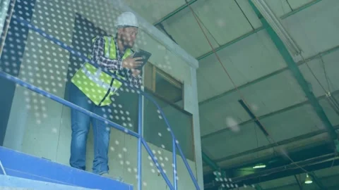 Globe and scroll text appearing fading revealing inspector on stair tapping Stock Footage 331165716