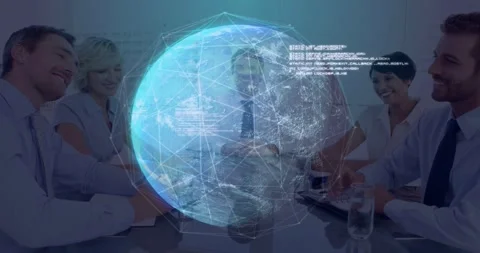 On globe appearing team sitting at table while globe gaining network and data Stock Footage 334040827