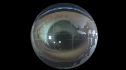 Globe on background of human eyes Video stock 39908117