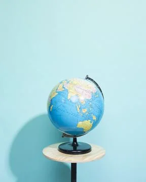 Globe blue background with copyspace Stock Photos