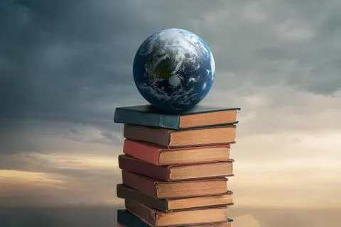 Globe on books isolated over white background Stock Photos