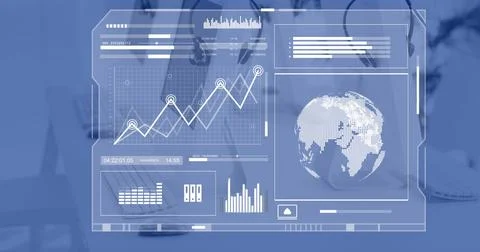 Globe, charts and graphs processing data over computers on desks in empty office Foto stock
