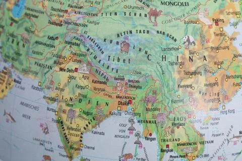 Globe close up. Map of continents - India, China, Asia. An indispensable devi Stock-Fotos