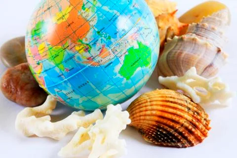 Globe with corals and shells Stock Photos