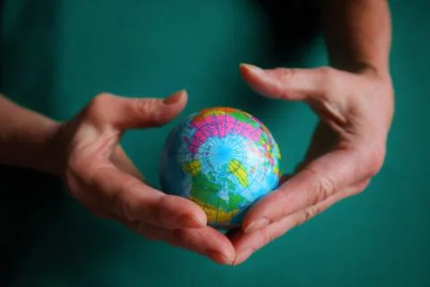 Globe ,earth in human hand Stock Photos