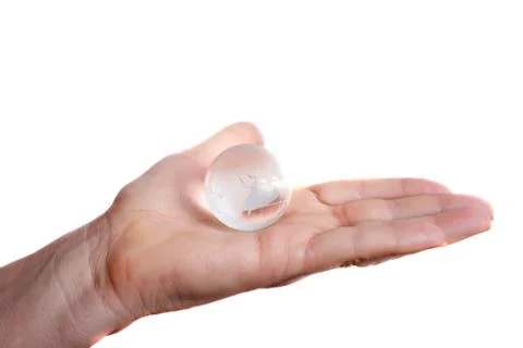 Globe on hand over white background Stock Photos