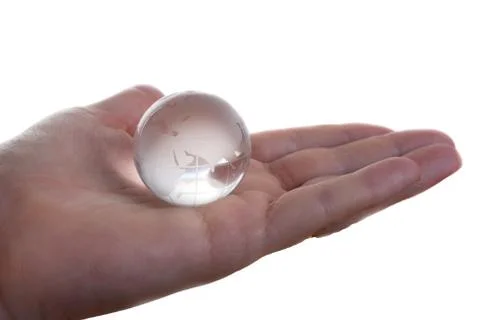Globe on hand over white background Stock Photos