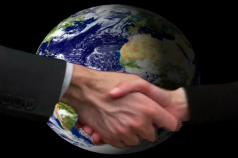 Globe with hand shake V2 - NTSC Stock Footage 663882