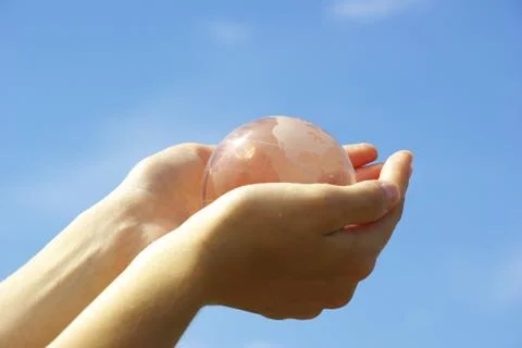 Globe in hands Foto stock