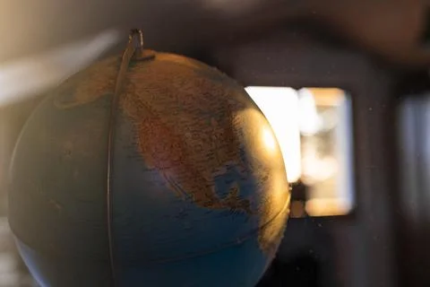 Globe illuminated by the sun Stock Photos