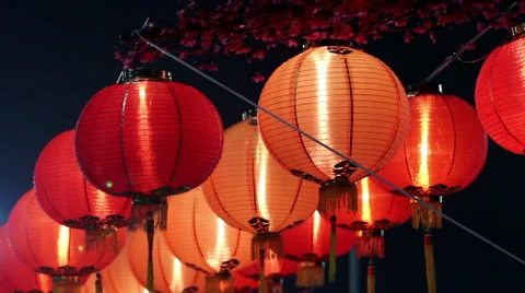 Globe Lanterns turned on at night Stock Footage 44417421