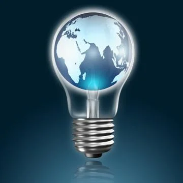 Globe in light bulb on blue background Stock Photos