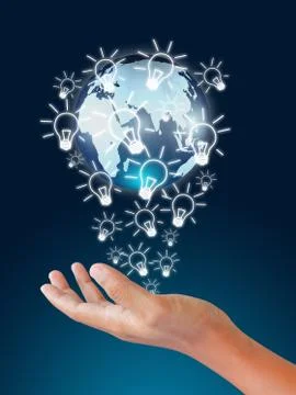 Globe in light bulb on blue background Stock Photos