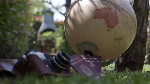 Globe map of the world passport and old vintage camera composition Video stock 90021739