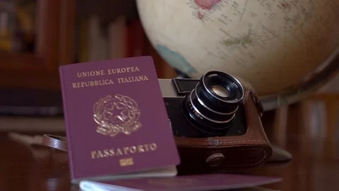 Globe map of the world passport and old vintage camera composition Stock Footage 90021743