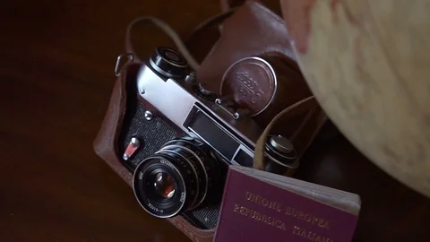 Globe map of the world passport and old vintage camera composition Stock Footage 90021750