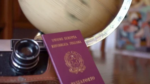 Globe map of the world passport and old vintage camera composition Stock Footage 90021781