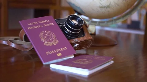 Globe map of the world passport and old vintage camera composition Stock Footage 90021800