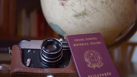 Globe map of the world passport and old vintage camera composition Stock Footage 90022221