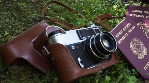 Globe map of the world passport and old vintage camera composition Stock Footage 90024274
