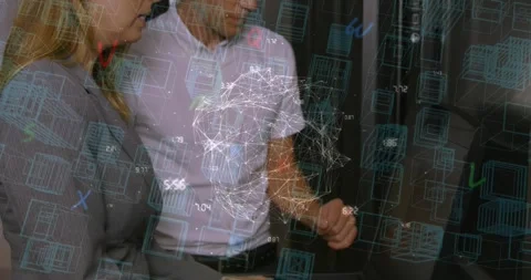 Globe of network of connections over caucasian male and female engineer working Stock Footage 326305590