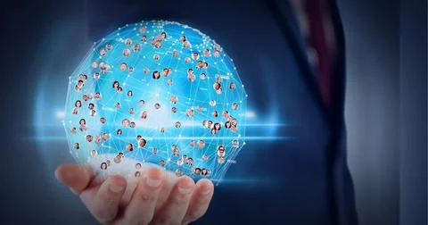 Globe of network of profile icons over hand of businessman against blue 스톡 사진