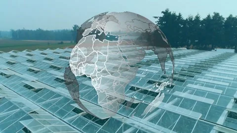 Globe overlay appearing triggers rotating translucent globe over greenhouses, Stock Footage 327064773