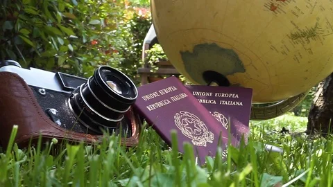 Globe passport old vintage camera travel adventure Stock Footage 90030175