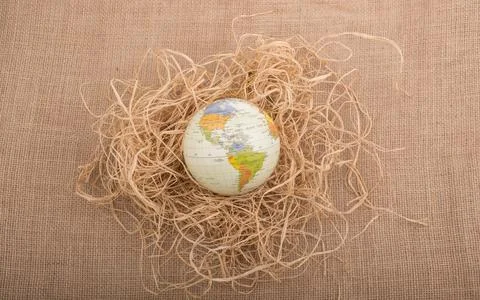 Globe placed on canvas background Fotos Stock