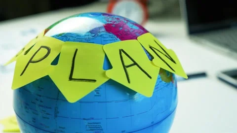 Globe with PLAN Sticky Notes on Desk Stock Footage 321223558