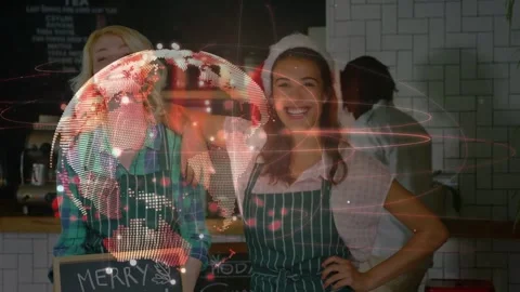 Globe popping two staff posing cafe counter Xmas ad as rings revealing chalk Video stock 331227562
