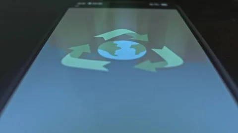 Globe with Recycling arrow, graphic presentation on smartphone Stock Footage 303911298