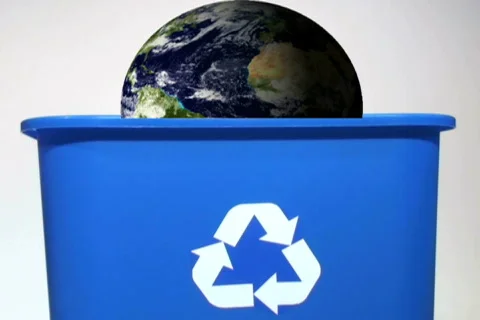 Globe in recycling bin - NTSC Stock Footage 665334